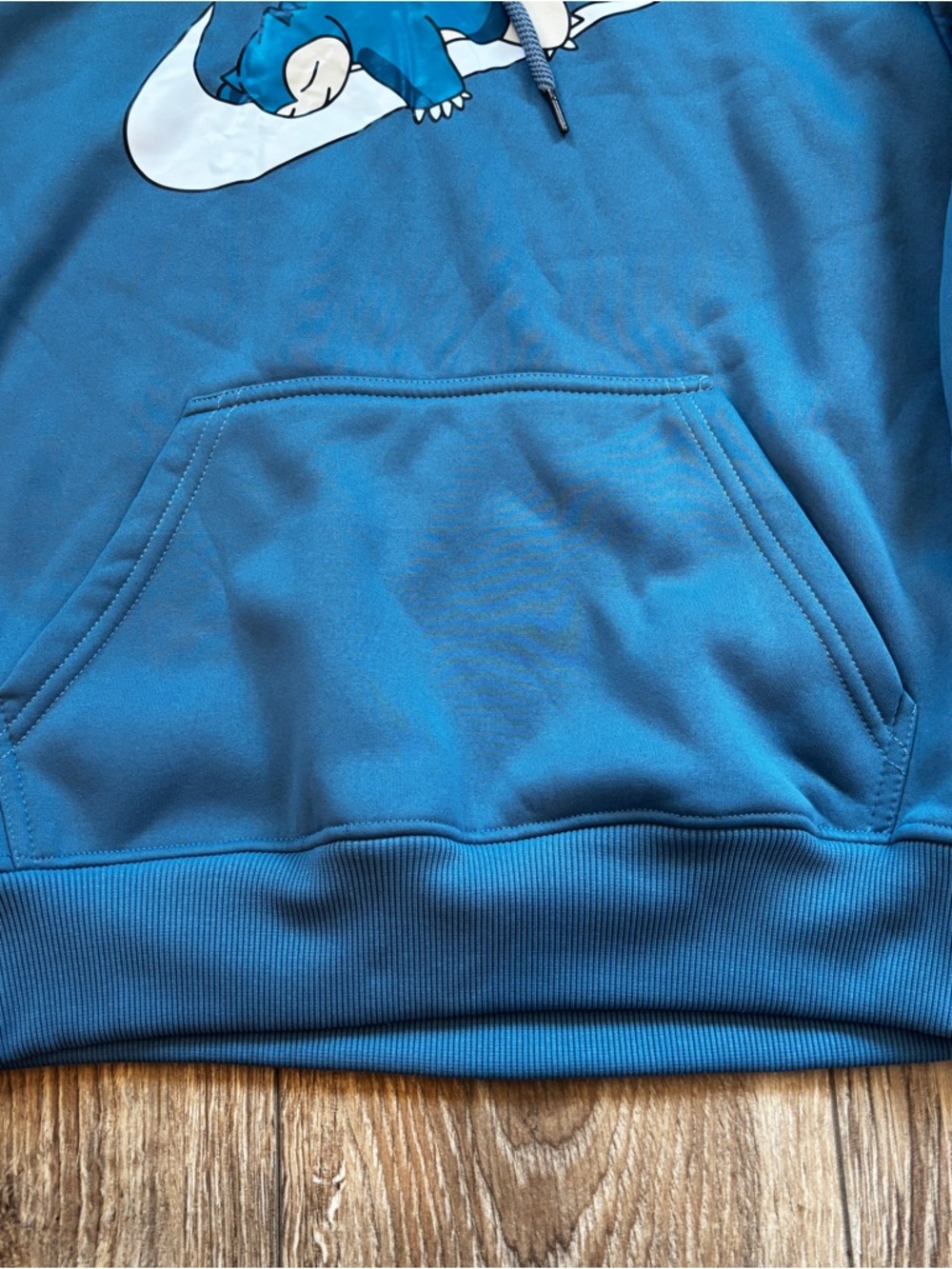 Teal Pullover Hoodie with White Swoosh and Sleeping Creature - Picture 7 of 9